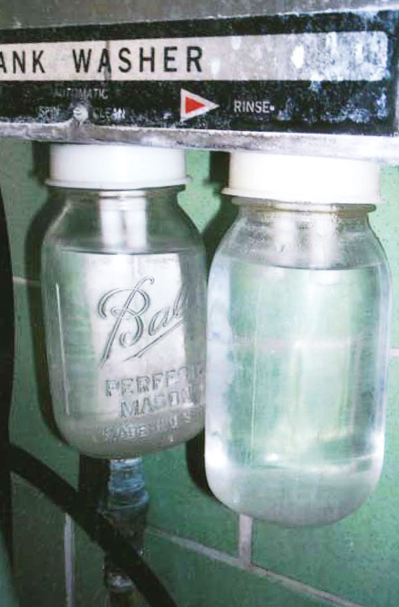 Glass chemical jars in washer