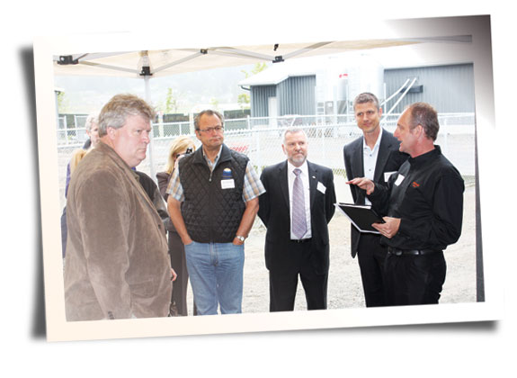 John De Jonge (right),  Bill Vanderkooi (left),  & members of local government.